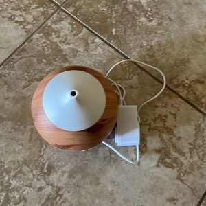 Mister for essential oils or plain water with mood lighting